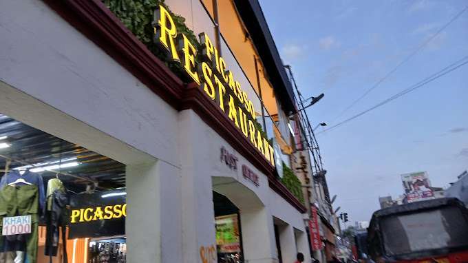 Elegant exterior of Picasso Steakhouse Nairobi with illuminated Picasso restaurant sign