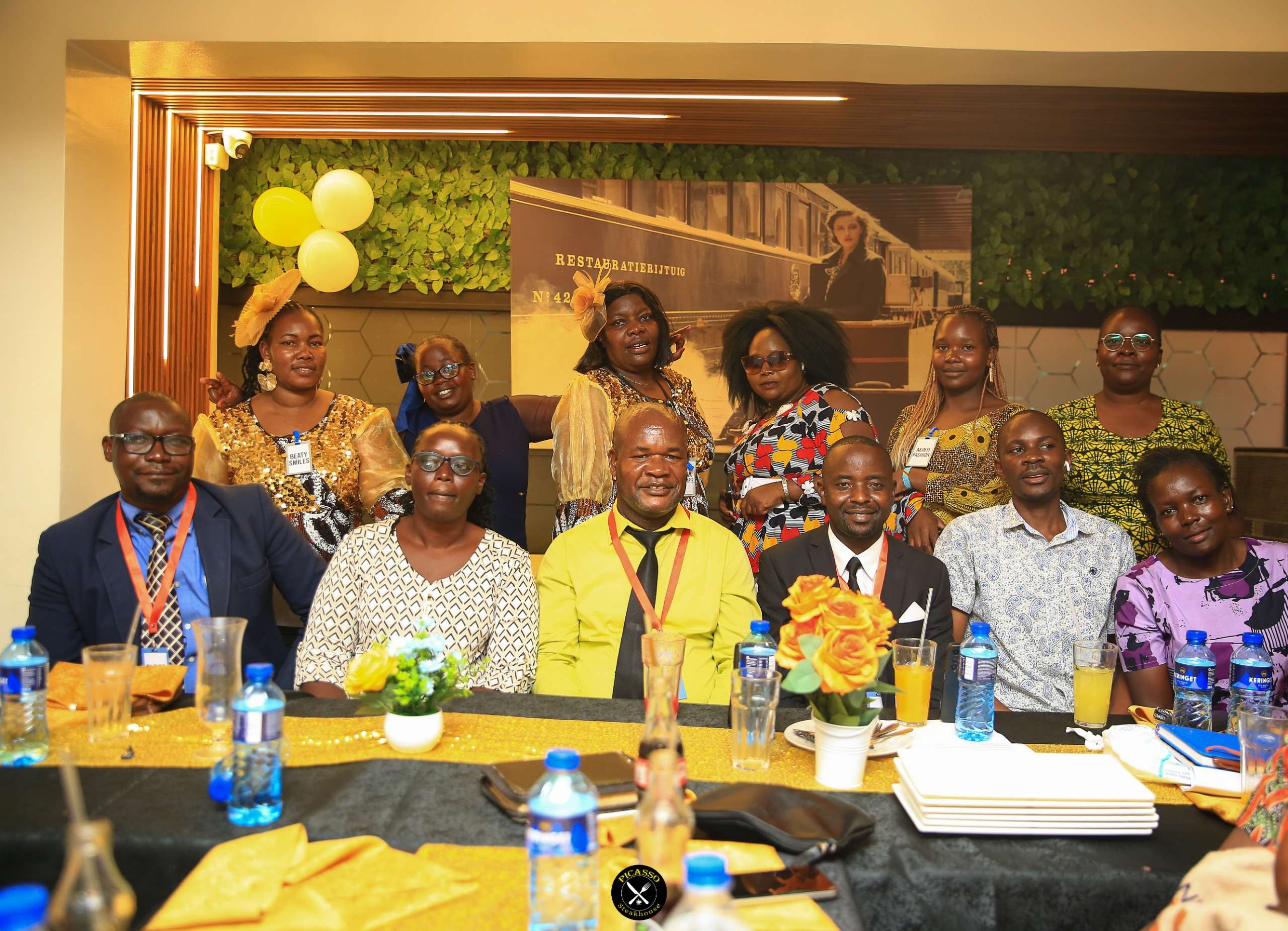 Professional corporate gathering with tables set for dining and presentations