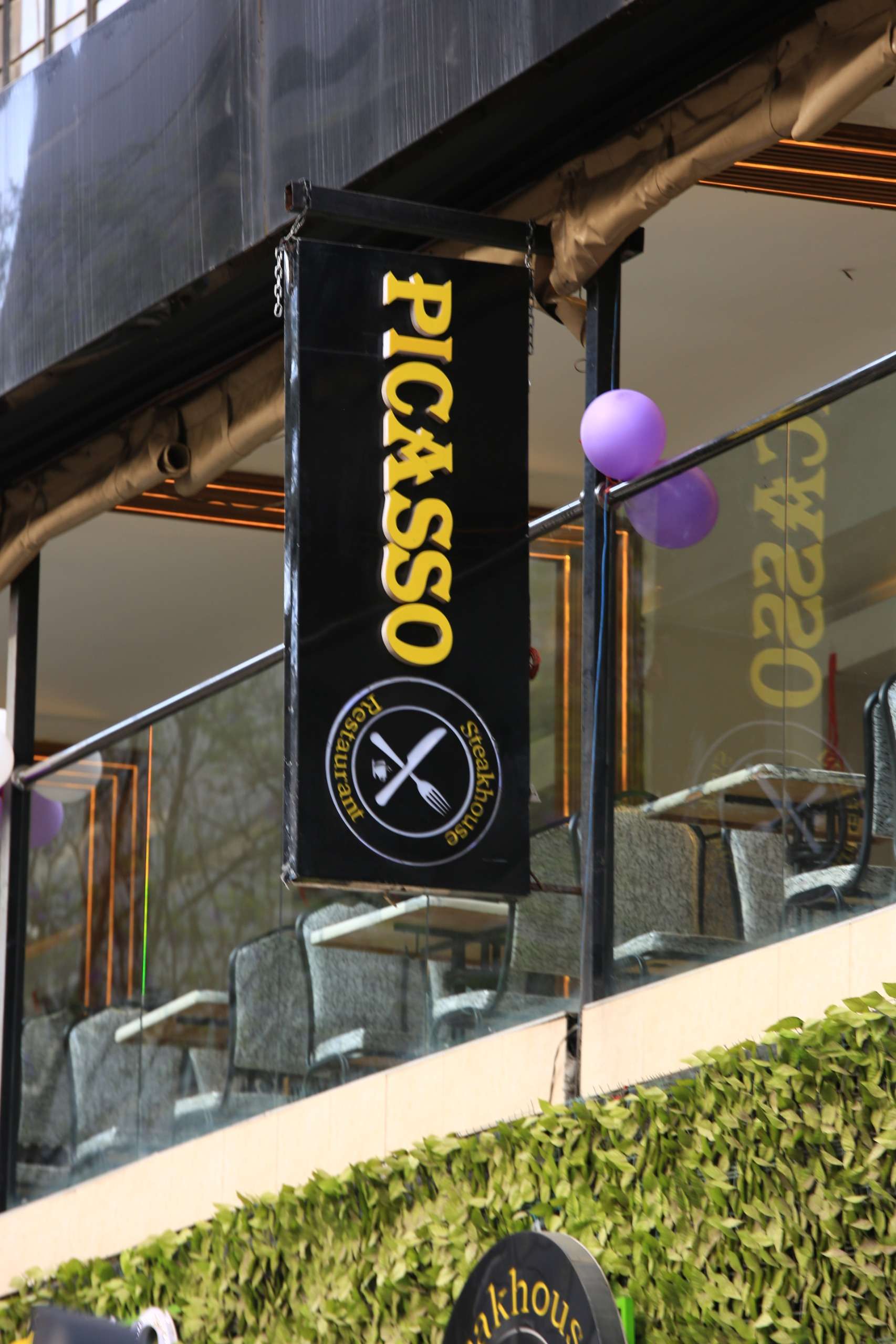 Branded exterior signage at Picasso Steakhouse & Restaurants in Nairobi